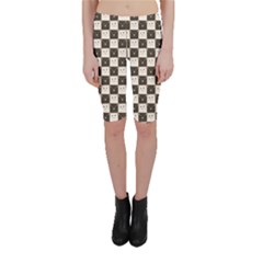 Black Chessboard Made Of Black And White Cats Cropped Leggings by CoolDesigns