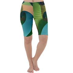Ribbons Of Blue Aqua Green And Orange Woven Into A Curved Shape Form This Background Cropped Leggings  by Nexatart